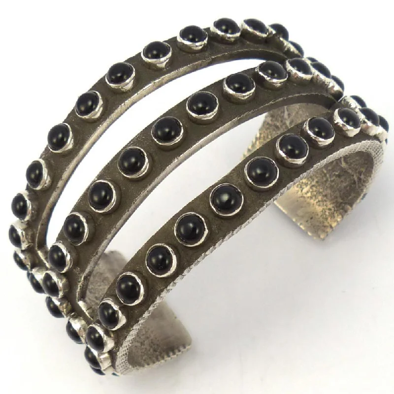 women's charm bracelets -Onyx Row Cuff